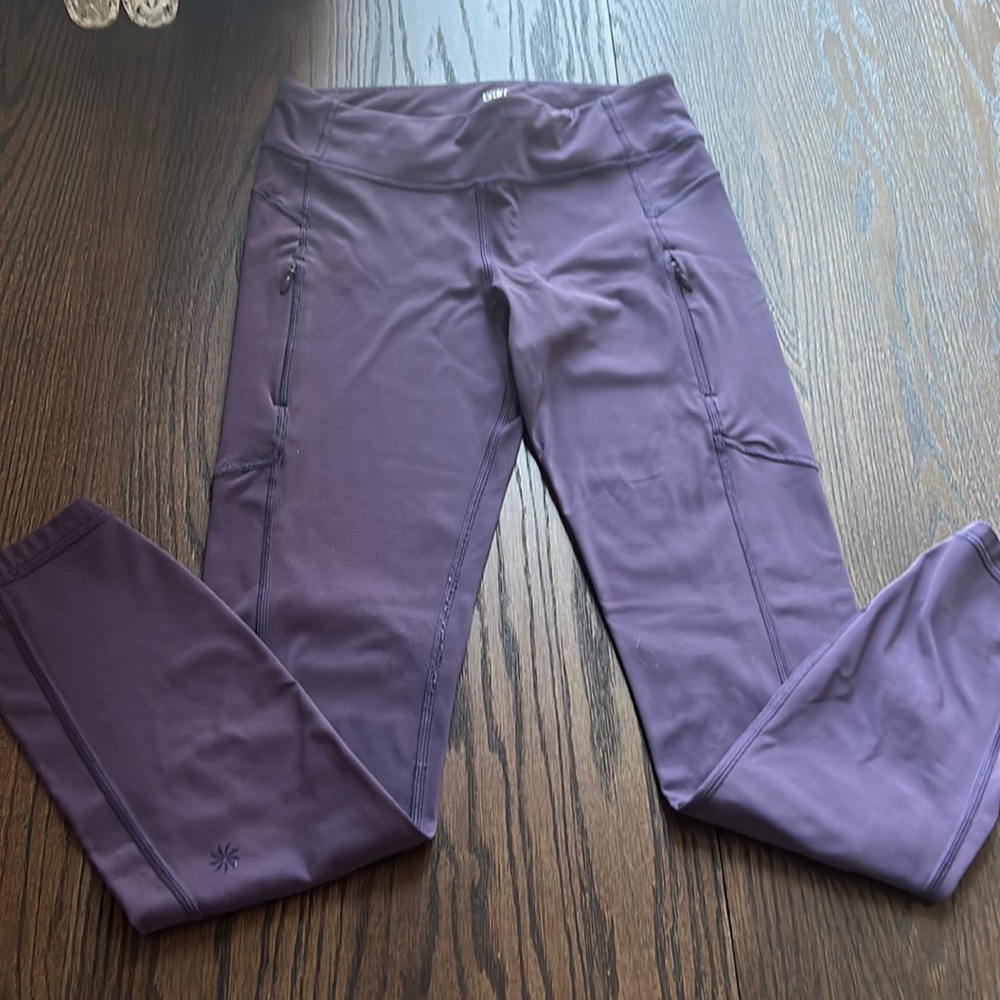 Purple Athleta leggings with pockets